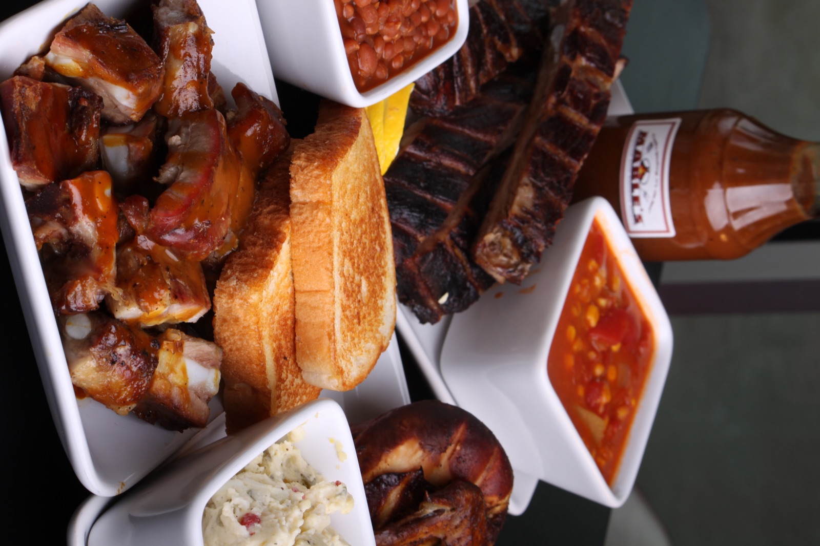 A spread of Mable's ribs, rib tips, baked beans, slaw and Texas toast